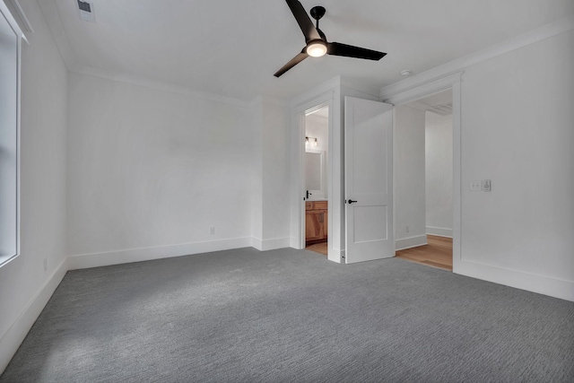 1018 Keeneland Dr, Gallatin, TN 37066 - spare room featuring light colored carpet, a ceiling fan, ornamental molding, and baseboards