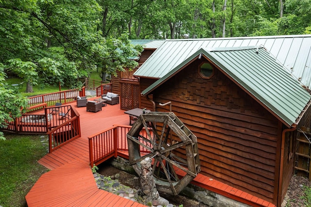 deck featuring outdoor lounge area