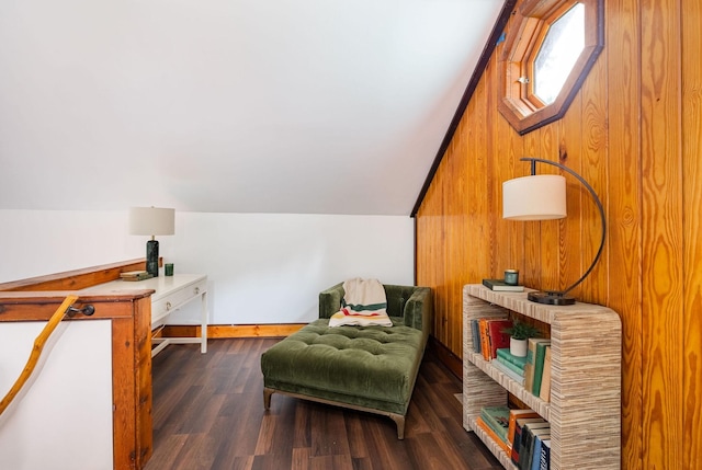 sitting room featuring lofted ceiling and wood finished floors