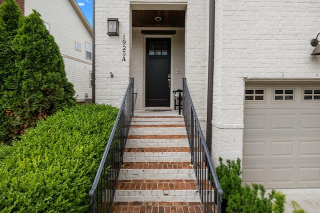 entrance to property with brick siding