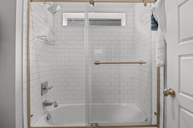 bathroom featuring enclosed tub / shower combo
