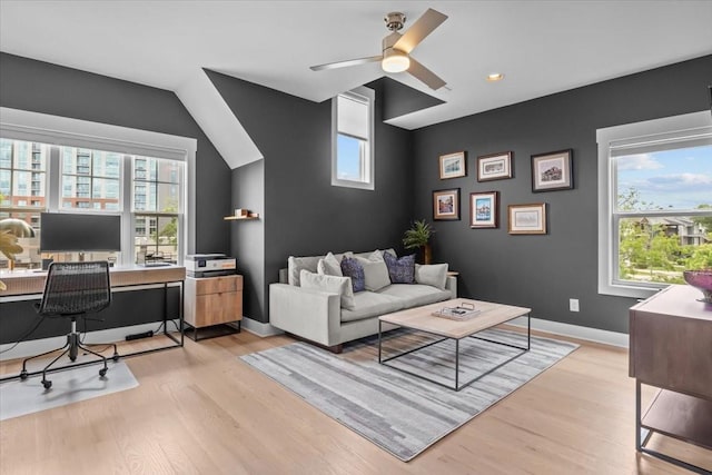 office area featuring light wood-type flooring, healthy amount of natural light, ceiling fan, and recessed lighting