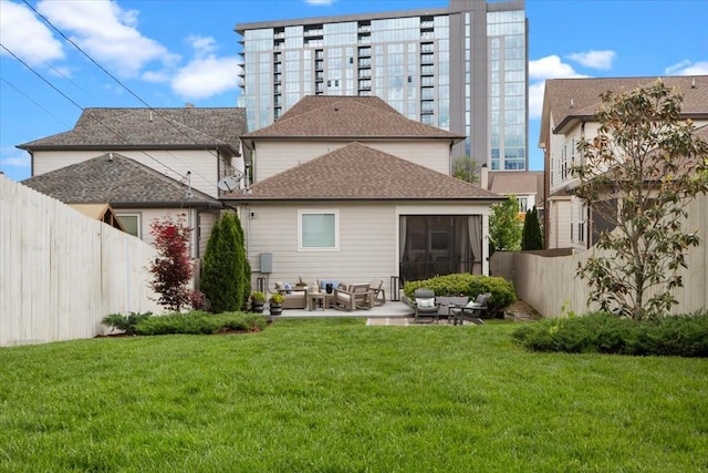 rear view of property featuring an outdoor living space, roof with shingles, and a patio area