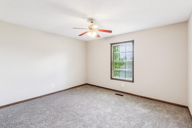 5245 Galen Rd, Lafayette, TN 37083 - carpeted empty room featuring a ceiling fan and baseboards