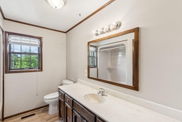 5245 Galen Rd, Lafayette, TN 37083 - bathroom with crown molding, toilet, wood finished floors, vanity, and a shower