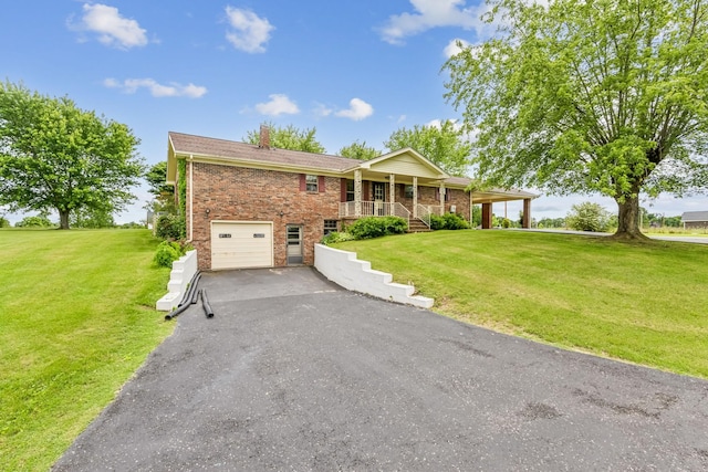 5245 Galen Rd, Lafayette, TN 37083 - ranch-style home featuring asphalt driveway, brick siding, a front lawn, and a porch
