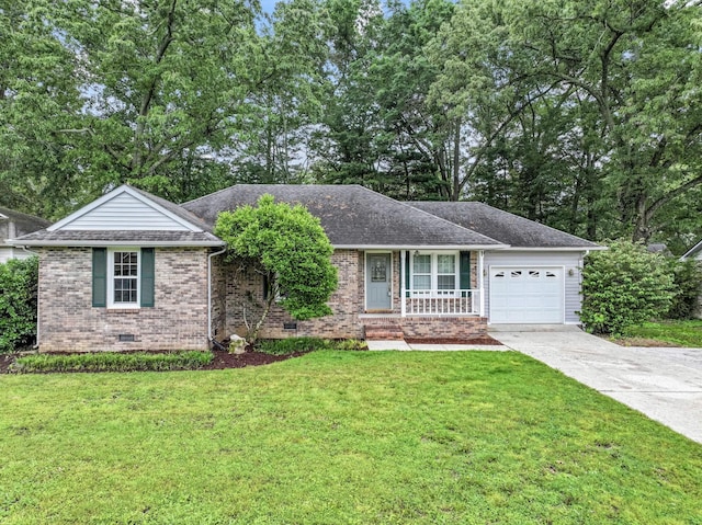 118 Bradbury Ct, Tullahoma, TN 37388 - ranch-style home with an attached garage, brick siding, a front lawn, and driveway