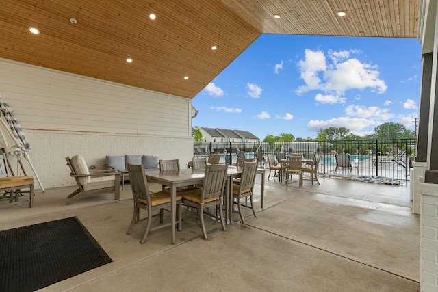 895 Industrial Dr, Old Hickory, TN 37138 - view of patio / terrace featuring fence, outdoor dining space, and a community pool