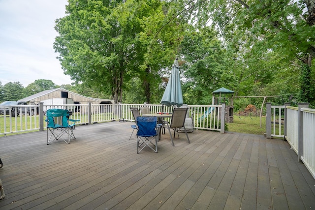 wooden deck with outdoor dining area
