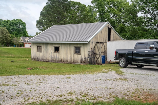 view of outbuilding featuring an outbuilding