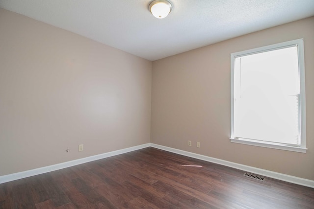 587 Joshua Dr, Clarksville, TN 37042 - spare room featuring dark wood finished floors and baseboards