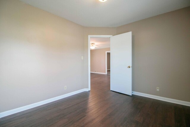 587 Joshua Dr, Clarksville, TN 37042 - empty room with dark wood finished floors and baseboards