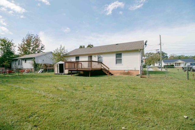 587 Joshua Dr, Clarksville, TN 37042 - rear view of property with a wooden deck, a storage unit, crawl space, an outbuilding, and a shingled roof