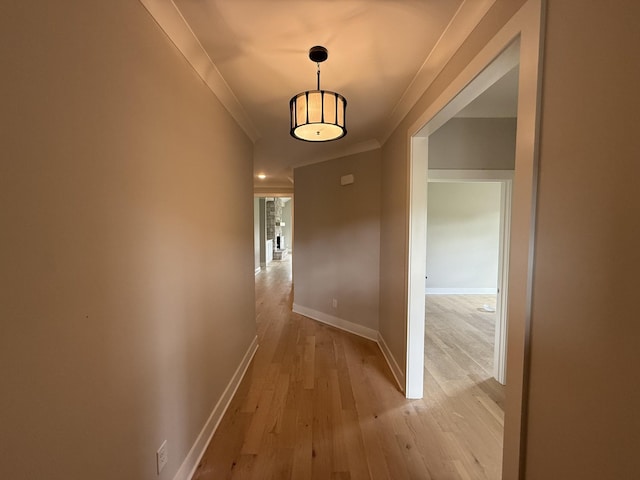 2301 Rockweather Ct, Murfreesboro, TN 37128 - hallway featuring crown molding, light wood-style flooring, and baseboards