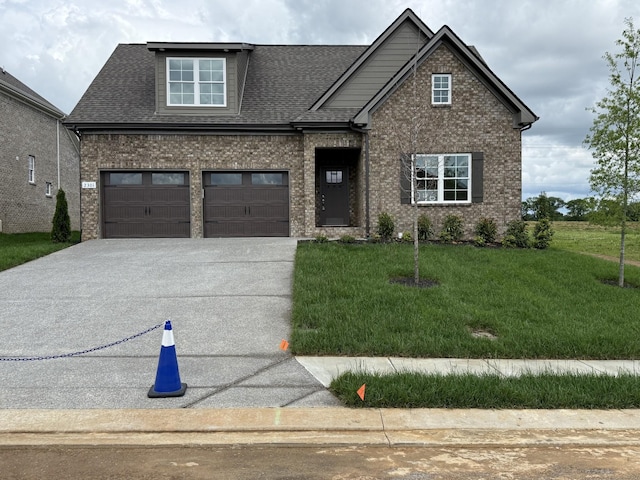 2301 Rockweather Ct, Murfreesboro, TN 37128 - traditional-style home with driveway, a front yard, brick siding, a shingled roof, and an attached garage