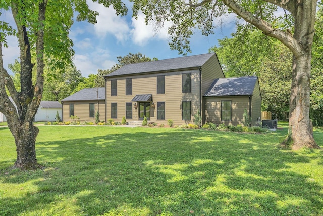 2513 Hillsboro Rd, Franklin, TN 37069 - colonial-style house featuring a front lawn and central air condition unit