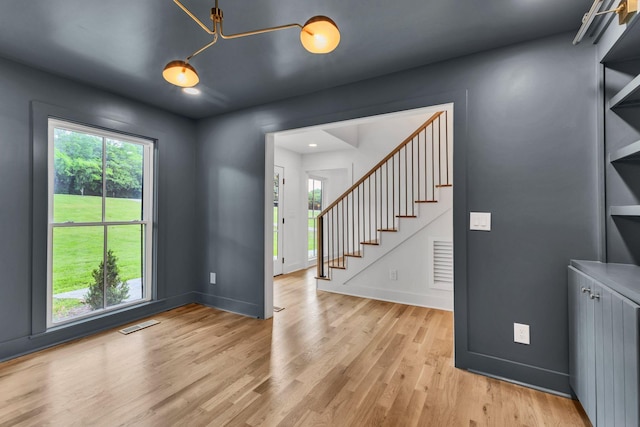 2513 Hillsboro Rd, Franklin, TN 37069 - entrance foyer featuring light wood-style floors, stairs, and baseboards