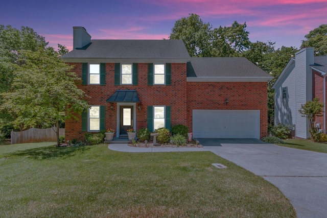 705 W Statue Ct, Franklin, TN 37067 - colonial home with driveway, a chimney, a garage, brick siding, and a shingled roof