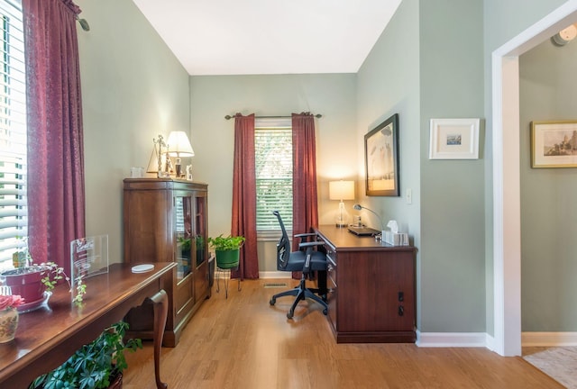705 W Statue Ct, Franklin, TN 37067 - home office with wood finished floors and baseboards