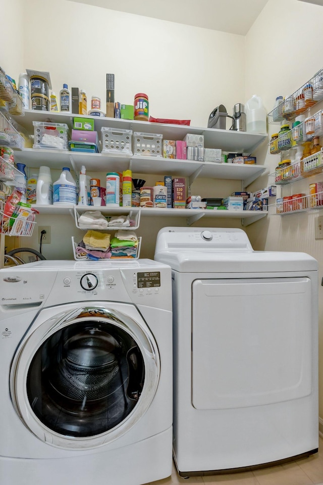705 W Statue Ct, Franklin, TN 37067 - laundry room featuring washing machine and clothes dryer