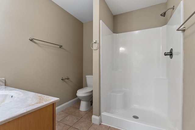 1643 Bobby Nichols Dr, Cookeville, TN 38506 - bathroom featuring a shower, tile patterned flooring, toilet, and baseboards