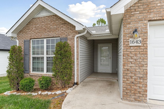 1643 Bobby Nichols Dr, Cookeville, TN 38506 - property entrance featuring brick siding and a shingled roof