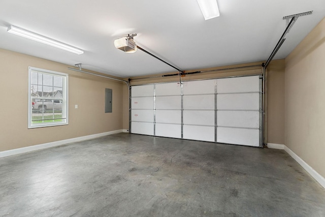 1643 Bobby Nichols Dr, Cookeville, TN 38506 - garage with electric panel, a garage door opener, and baseboards