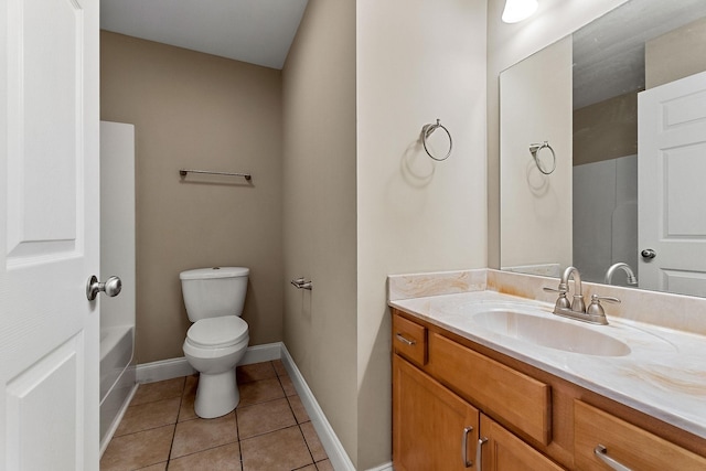 1643 Bobby Nichols Dr, Cookeville, TN 38506 - full bathroom with vanity, tile patterned floors, toilet, baseboards, and a shower