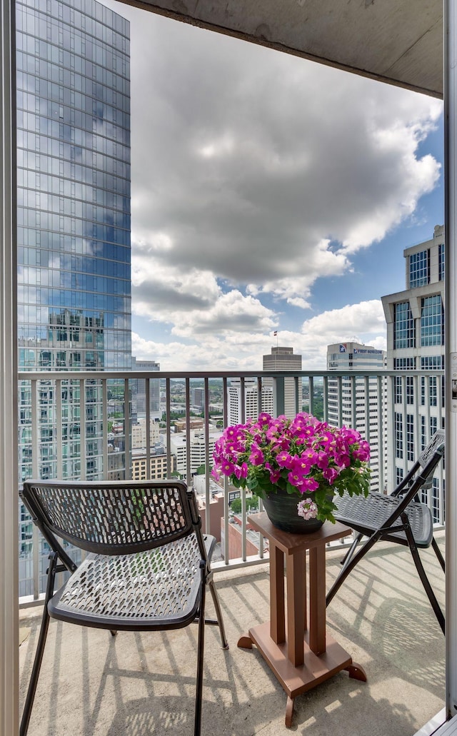 balcony featuring a view of city