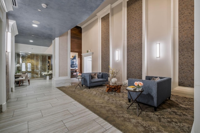 building lobby with wallpapered walls
