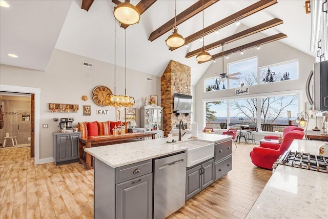 510 Lookout View Dr Unit Rb-177, Jasper, TN 37347 - kitchen featuring gray cabinets, stainless steel appliances, open floor plan, a sink, and high vaulted ceiling
