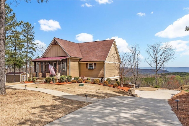 510 Lookout View Dr Unit Rb-177, Jasper, TN 37347 - view of front of home with a storage shed, an outdoor structure, board and batten siding, and a mountain view