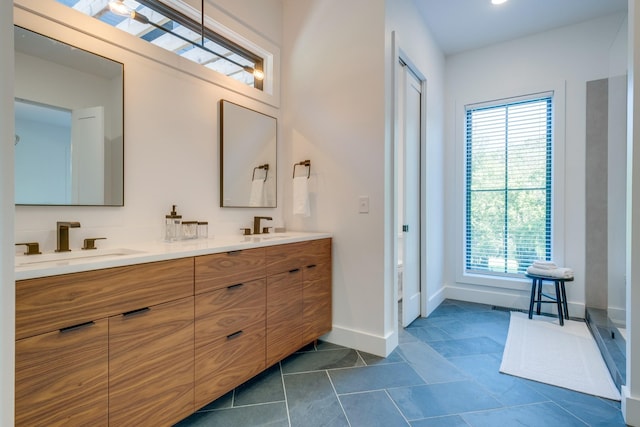 84 Judd Ln, Lancaster, TN 38569 - full bathroom with plenty of natural light, baseboards, and double vanity