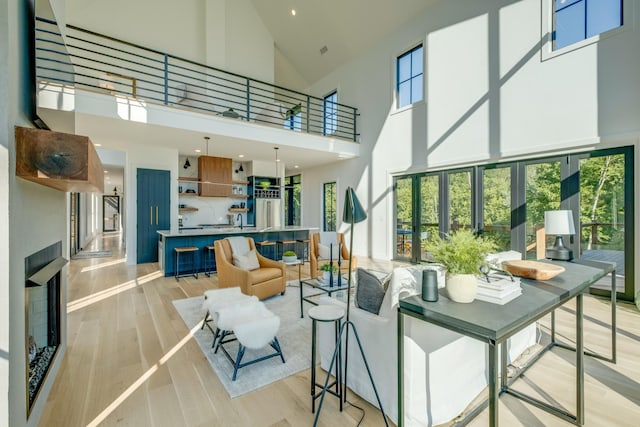 84 Judd Ln, Lancaster, TN 38569 - living room with a high ceiling, plenty of natural light, and light wood-style floors