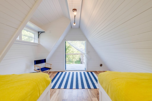 84 Judd Ln, Lancaster, TN 38569 - bedroom with wooden walls, vaulted ceiling, wooden ceiling, and wood-type flooring