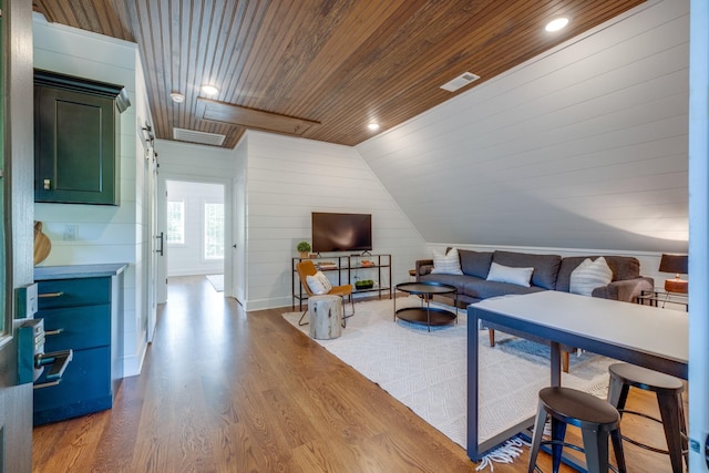 84 Judd Ln, Lancaster, TN 38569 - living room with wood finished floors, wooden ceiling, vaulted ceiling, wooden walls, and recessed lighting