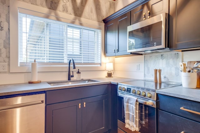 84 Judd Ln, Lancaster, TN 38569 - kitchen featuring stainless steel appliances, a sink, and light countertops