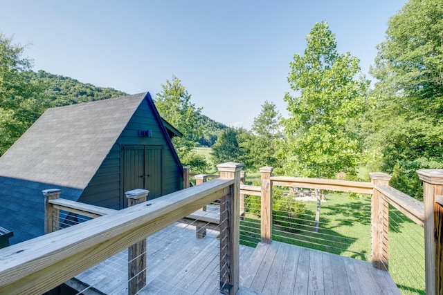 84 Judd Ln, Lancaster, TN 38569 - wooden terrace featuring a shed and an outbuilding