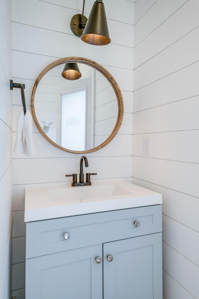 84 Judd Ln, Lancaster, TN 38569 - bathroom featuring vanity and wood walls