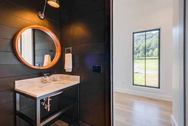 84 Judd Ln, Lancaster, TN 38569 - bathroom with wood finished floors, vanity, and baseboards