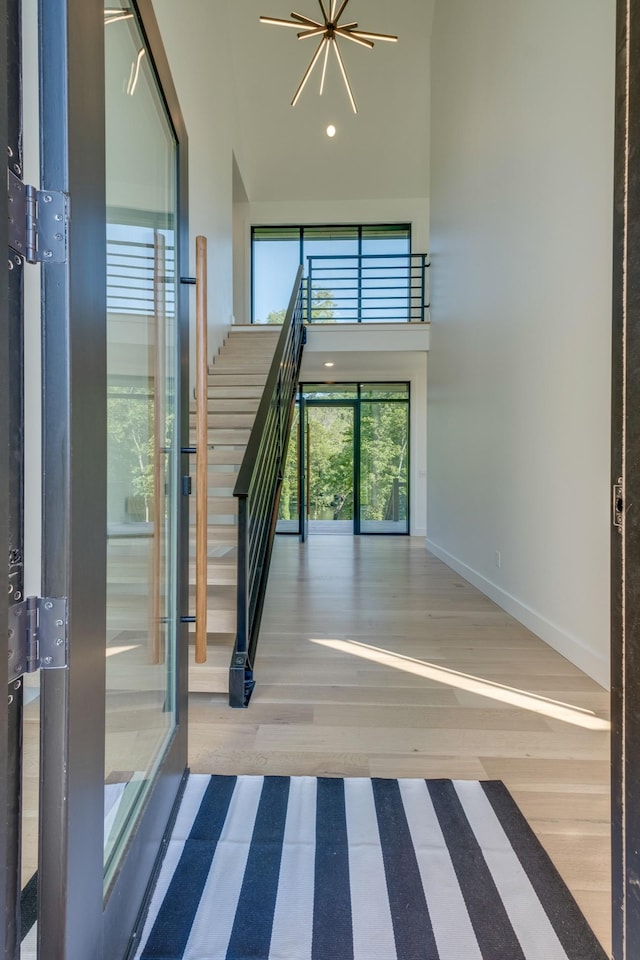 84 Judd Ln, Lancaster, TN 38569 - interior space with stairs, baseboards, a high ceiling, recessed lighting, and wood finished floors