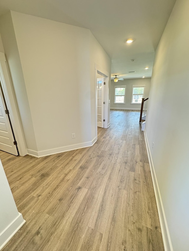 7639 Rookers Bend Dr, Smyrna, TN 37167 - hallway featuring light wood-type flooring, baseboards, an upstairs landing, and recessed lighting