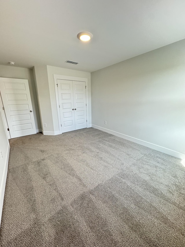 7639 Rookers Bend Dr, Smyrna, TN 37167 - unfurnished bedroom with baseboards, carpet floors, and a closet