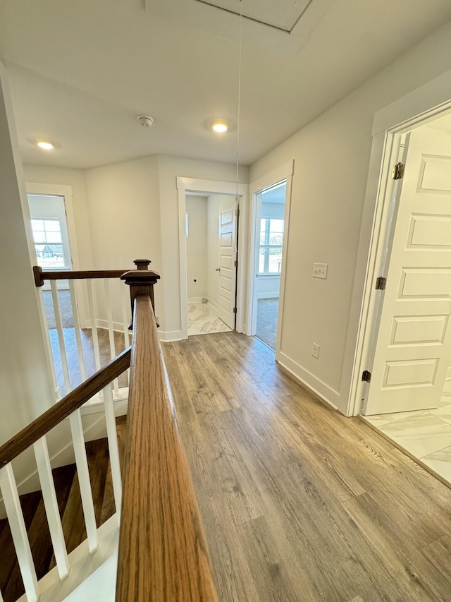7639 Rookers Bend Dr, Smyrna, TN 37167 - hallway with an upstairs landing, light wood-style floors, healthy amount of natural light, recessed lighting, and attic access