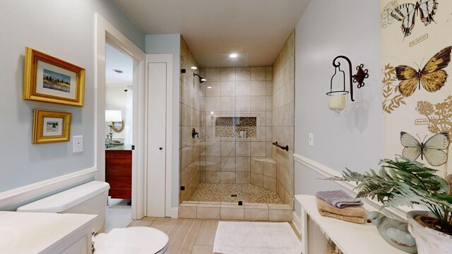 152 Bluegrass Dr, Hendersonville, TN 37075 - bathroom featuring a shower stall, vanity, toilet, and wood finished floors