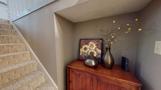 152 Bluegrass Dr, Hendersonville, TN 37075 - staircase featuring baseboards and a textured ceiling