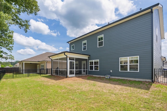 back of house with a sunroom
