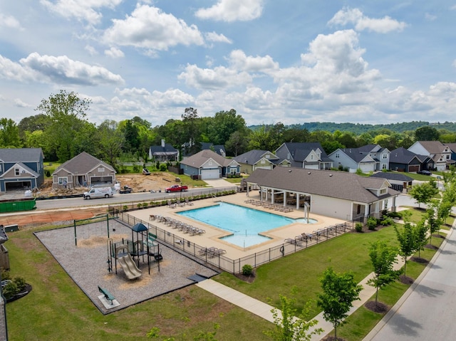community pool featuring a residential view