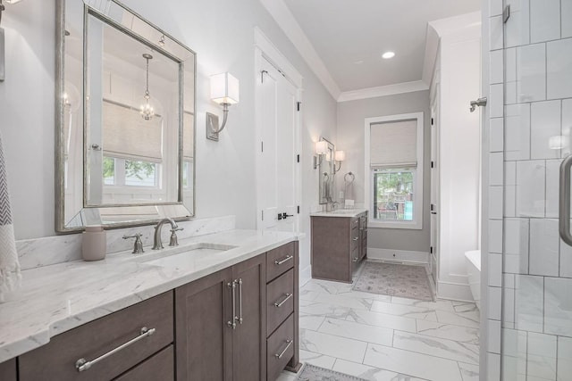 bathroom with ornamental molding, marble look tiles, two vanities, a soaking tub, and baseboards