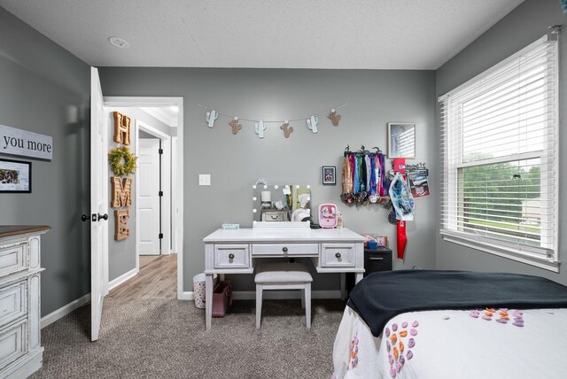 716 Ashwood Dr, Clarksville, TN 37043 - bedroom featuring carpet flooring and baseboards